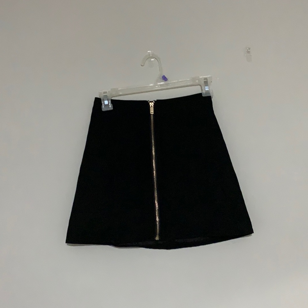 H&M high rise black tight skirt. Zipper in front.